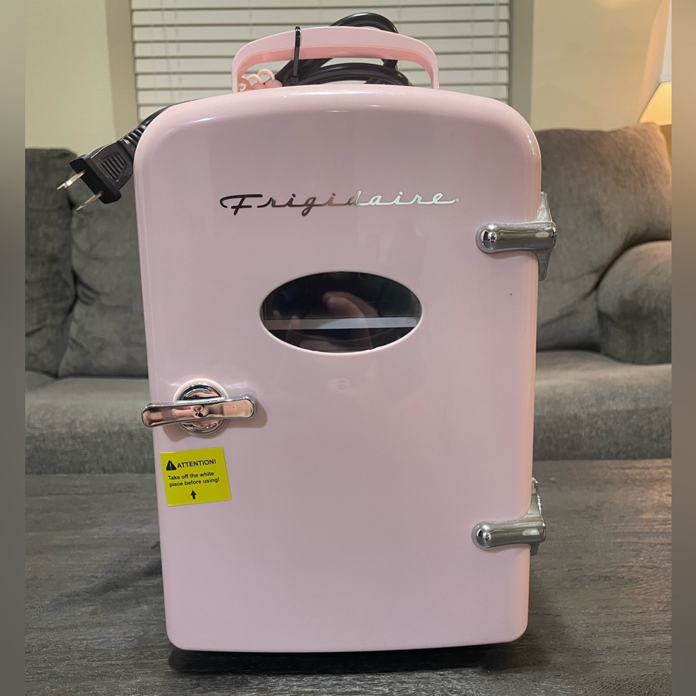 Frigidaire Pink Mini Fridge - 6 can capacity.